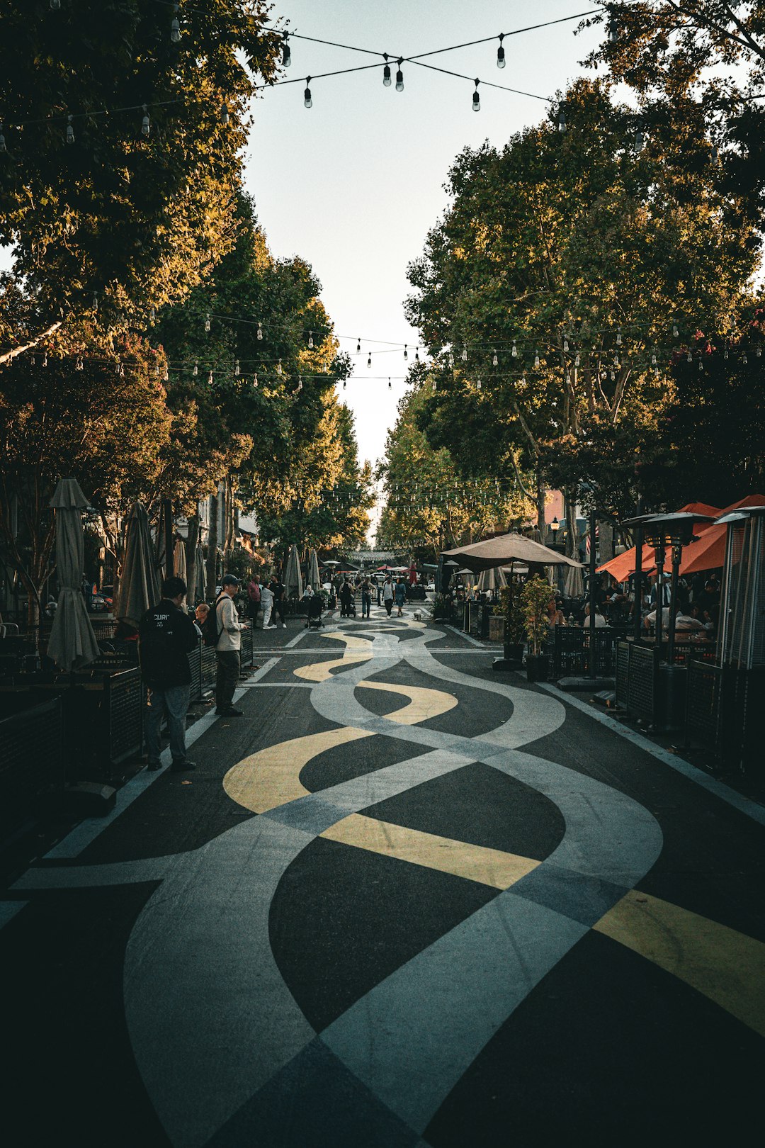 Buyer visiting a property's street in the evening to judge noise and traffic