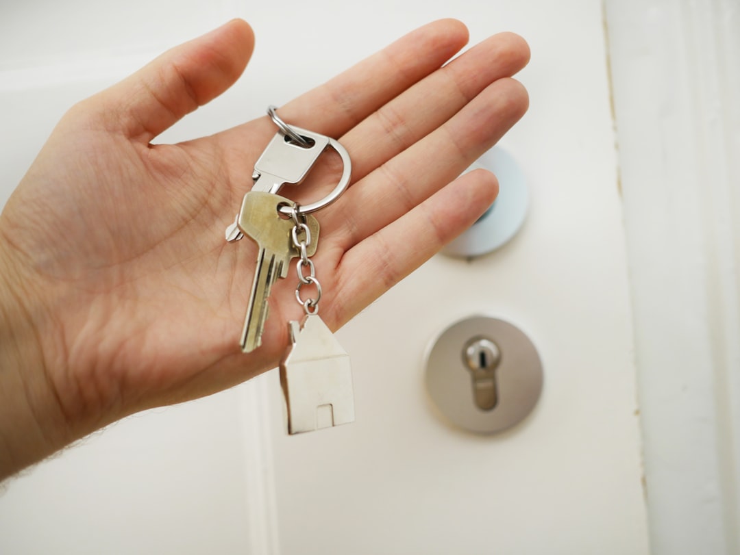 Couple receiving keys on completion day at the end of conveyancing