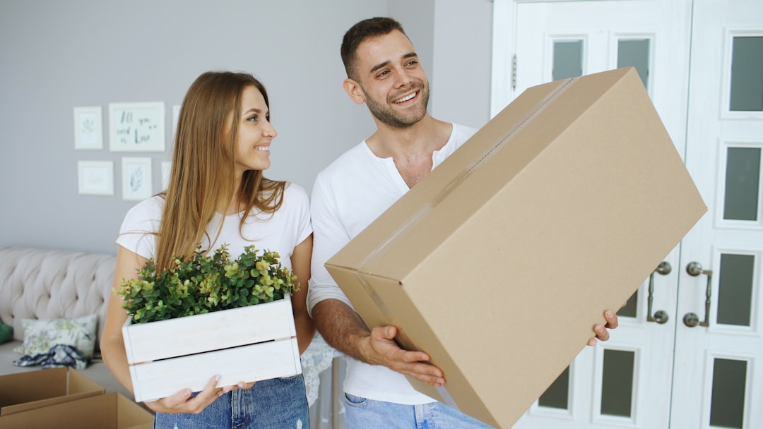 New homeowner unpacking after completion while conveyancing paperwork finishes