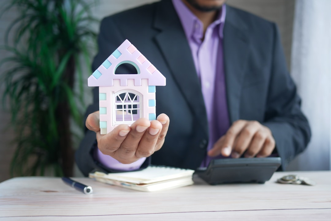 Buyer researching sold house prices and comparables before making an offer